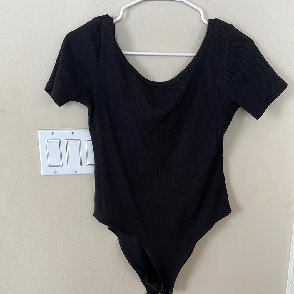 Slightly off the shoulder black body suit from H&M